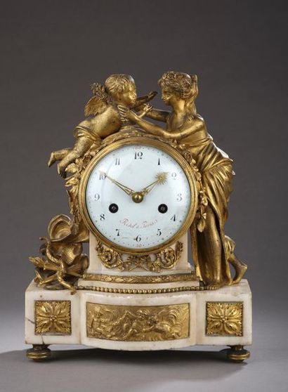 null A gilt bronze and white marble clock, the white enamelled dial with Arabic numerals...