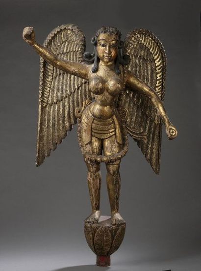 null Sculpture in carved, lacquered and gilded wood representing a winged genie guarding...