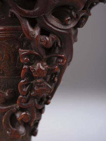 null Rhinoceros horn libation cup carved on the belly of archaic chilong in a frieze...