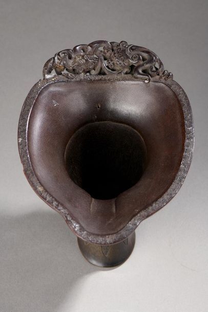 null Rhinoceros horn libation cup carved on the belly of archaic chilong in a frieze...