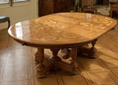null Dining room table in light wood veneer. The tray centered by a rosette surrounded...