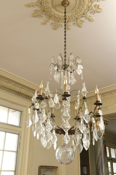 Chandelier with six metal light arms decorated...