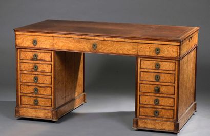 null Pedestal desk on castors on all sides, opening with ten small side drawers and...