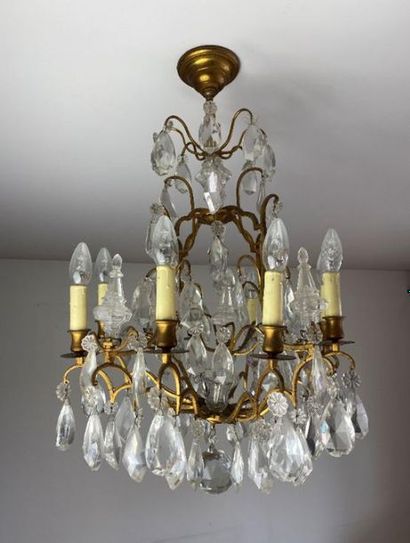 null Chandelier cage with eight gilt bronze light arms and pendants (one veiled axis).x000D_


High....
