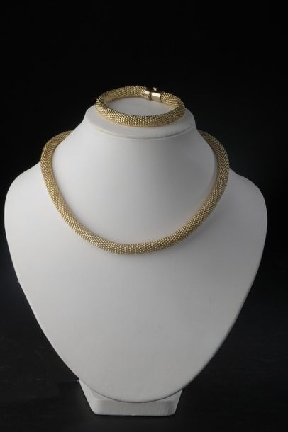 null QUADRI.
Semi-parure en or jaune 18k comprenant un collier et un bracelet à maille...