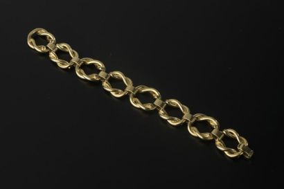 null Bracelet en or jaune 18k à maillons nœuds marins articulés.
Long. : 20 cm -...