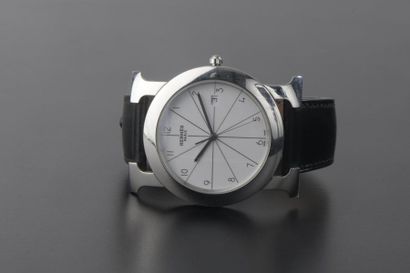 null HERMÈS.
Montre bracelet d'homme en acier, modèle "Heure H", le boitier rond...