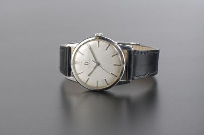 null OMÉGA. 
Montre bracelet d'homme, le boîtier rond en acier, le cadran argenté...