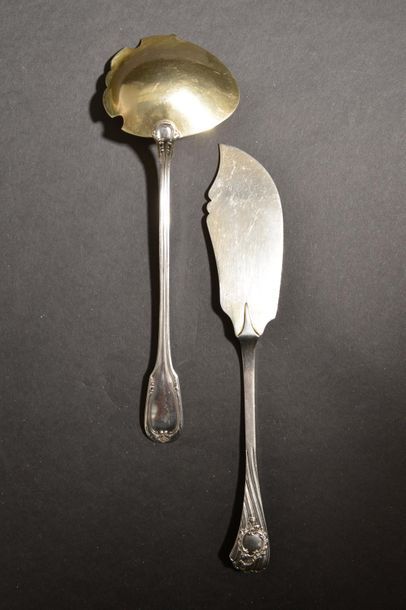 null Set in silver including a shovel, the spatula with palmette motifs, the back...
