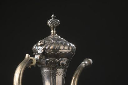 null Silver ewer with long neck and slightly flattened belly in the Turkish taste,...