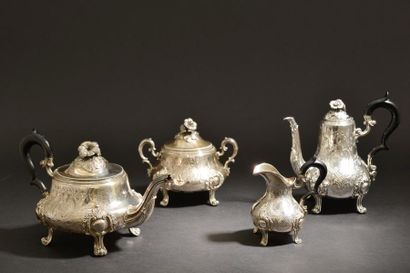null Silver tea and coffee service with chiselled decoration of foliage scrolls and...