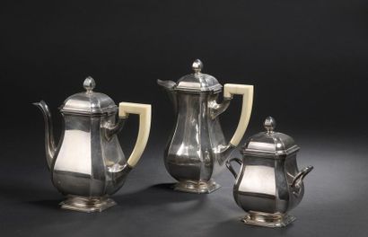 null Silver tea and coffee set with cut-away sides comprising a teapot, a coffee...