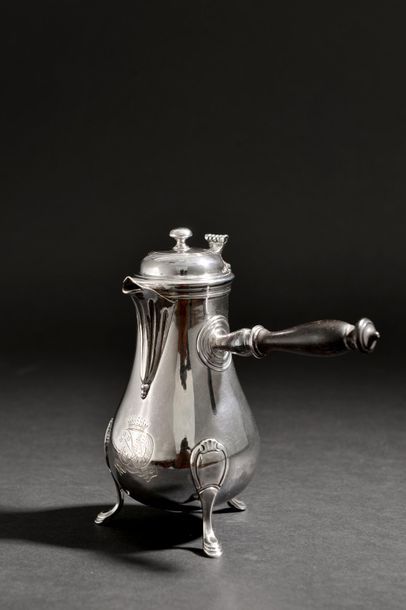 null Selfish silver tripod jug engraved with wedding ring arms surmounted by a count's...