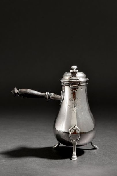 null Selfish silver tripod jug engraved with wedding ring arms surmounted by a count's...