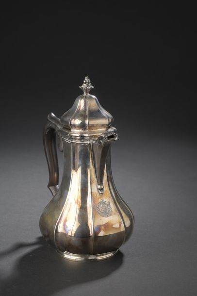 null Ribbed baluster coffee pot in plain silver probably engraved with the arms of...