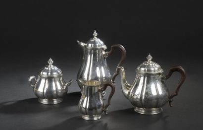 null Tea and coffee set in the form of a baluster with a large gadrooned belly on...