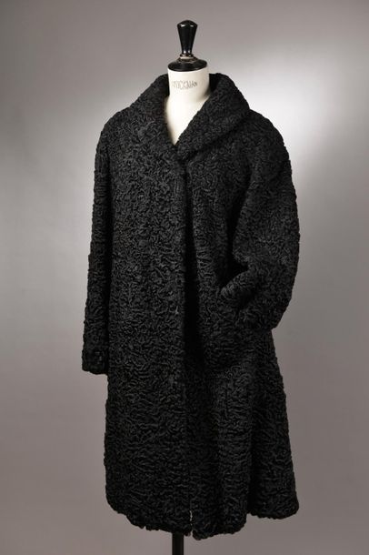 null Set consisting of an astrakhan long coat with a shawl collar and a black virgin...