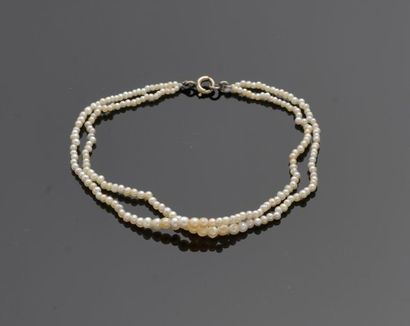null Small children's bracelet with two rows of fine pearls, the clasp in 18k white...