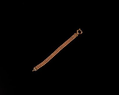 null 18k yellow gold bracelet, three strands composed of intertwined amatis circular...