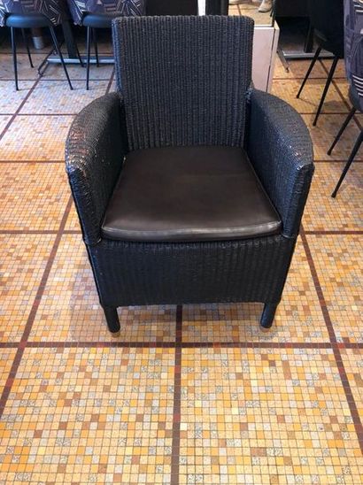 null 2 Vincent Sheppard armchairs in black "Lloyd Loom" weave, the
square back, the...