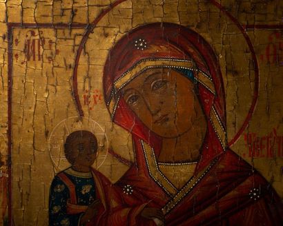 null Icône de la Vierge à l'Enfant.
Peinture sur panneau de bois (craquelures).
Russie,...