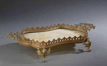 null Openwork bronze centerpiece with alabaster plate bottom, the grips decorated...