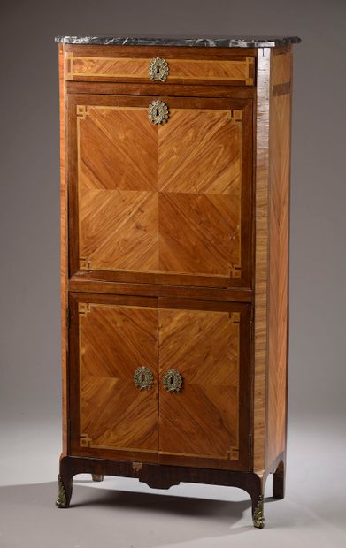 null Lady's secretary with rosewood veneer flap arranged as a butterfly wing in amaranth...