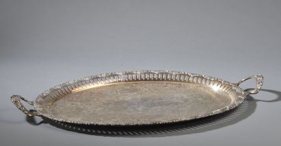 null Oval silver-plated copper tray, the basin engraved with volutes of foliage,...