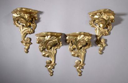 null Four carved and gilded wood sconces decorated with acanthus leaves. 

High....