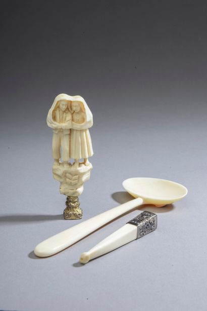 null Ivory set comprising a porridge spoon, a seal and a cigarette smoker

Late 19th...