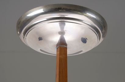 null 
Floor lamp in rosewood veneer, the square shaft holding a chromed metal basin...