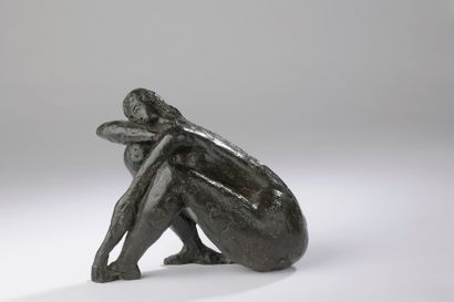 null 
Antoniucci VOLTI (1915-1989). 

Femme nue assise, la tête reposant sur son...