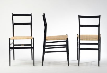 null 
Gio PONTI (1891-1979), éditions Cassina. 

Suite de douze chaises modèle "Superleggera"...