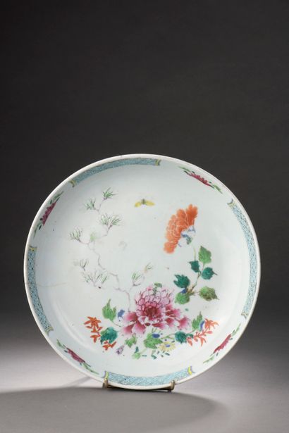 null CHINA - 19th century.

Porcelain circular dish decorated with peonies and flowering...