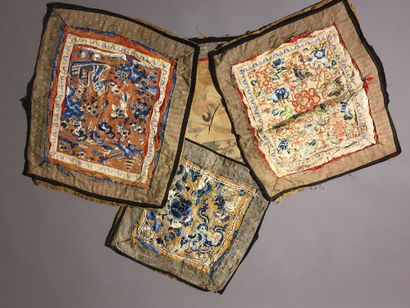 null CHINA - 19th century.

Four embroidered silk items decorated with flowers, pagodas...