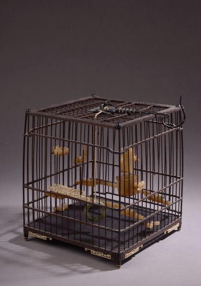 null 
CHINA - End of the 19th century.





A square wooden birdcage with a metal...