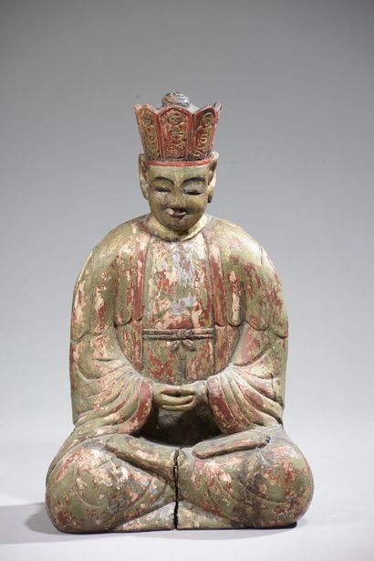 null CHINA - Late 19th century.

Seated dignitary in partially polychromed and lacquered...