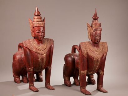 null THAILAND - 20th century.

A pair of red and gold lacquered wooden chimeras representing...