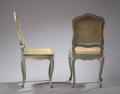 null Pair of caned chairs in green relacquered molded wood, the back slightly violonné....
