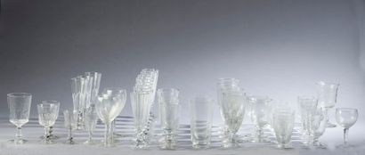 null Parts of a glassware set including:

- Fifty-eight mismatched flutes (chip to...