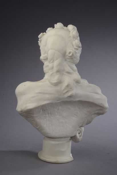 null A white marble bust of a woman with a flowery crown on a pedestal (accidents,...