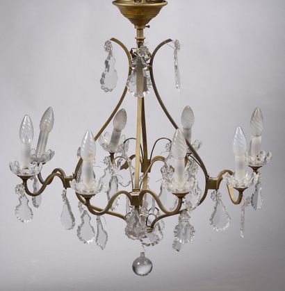 null *BACCARAT House.

Eight-light bronze cage chandelier with crystal pendants.

Around...