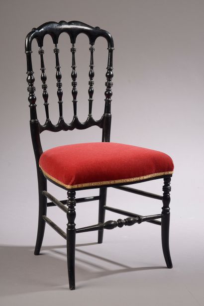 null Turned and blackened wood chair, the openwork back. Red velvet upholstery.

Napoleon...