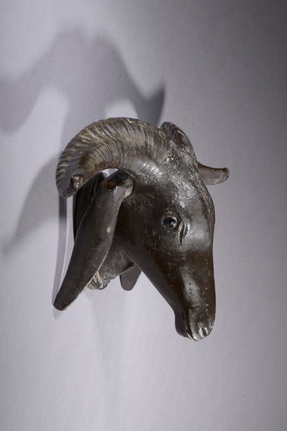 null Carved and painted wooden goat's head with real horns. Mobile ears.

Height...