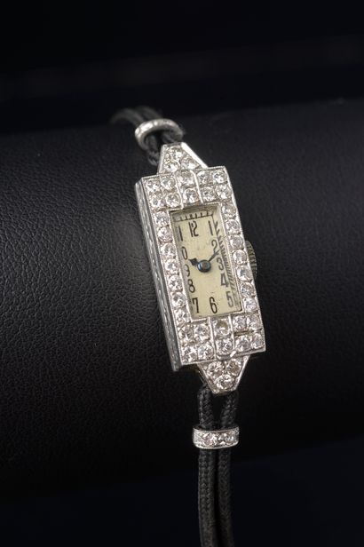 Ladies' wristwatch, the rectangular platinum...