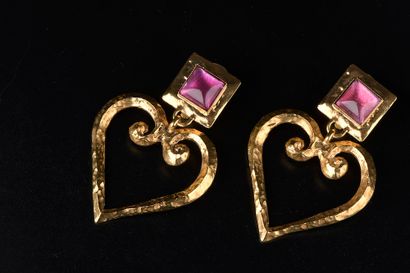 null YVES SAINT LAURENT.

A pair of gilt metal ear clips, the square plate with a...