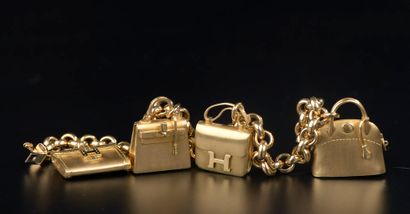 null HERMÈS.

Bracelet en or jaune 18k modèle "La ronde des sacs" à maille jaseron...