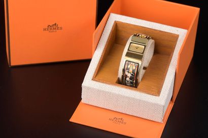 null HERMÈS.

Ladies' wristwatch model "Loquet". The rectangular gold-plated metal...
