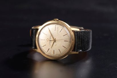 null ETERNA MATIC.

Men's wristwatch, 18k yellow gold case, champagne dial with baton...