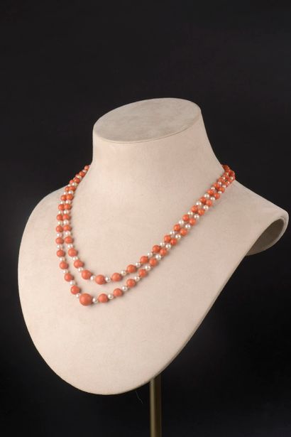 A two-row necklace composed of ninety-seven...